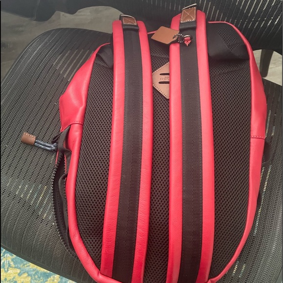Brand new Coach Backpack, medium size. Very soft, many pockets, smells amazing - Picture 2 of 4